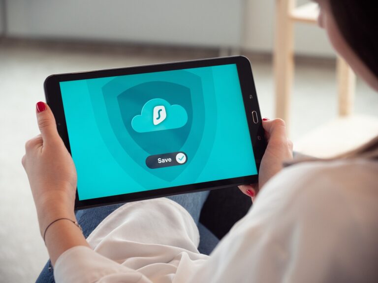 woman following online training on tablet